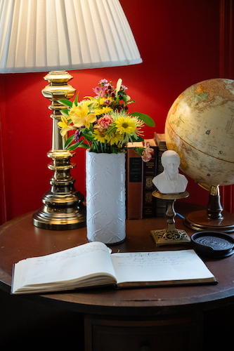 Spring flowers in the library of Stanton House Inn