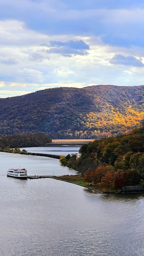 Ferry pulling up to dock on the Hudson River