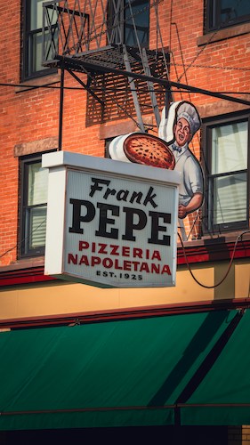 Frank Pepe counts as one of the best historic sites walking distance to the train, at this point