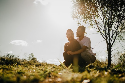 Couple enjoying a quiet moment in a field together