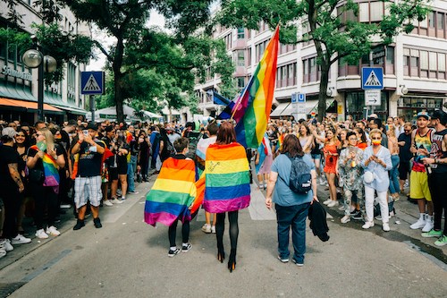 Pride parade down the street by the gay clubs and bars 