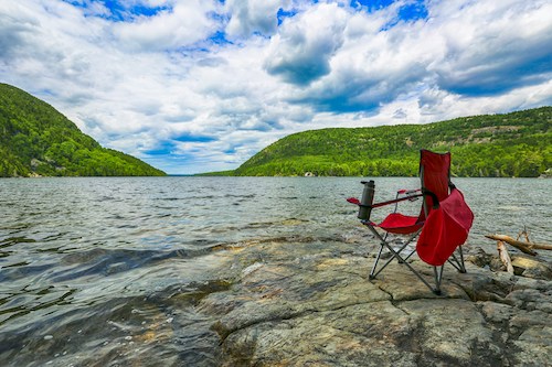 Camp chair along the water in Acadia National Park