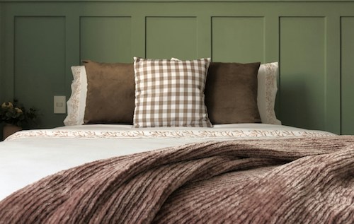 Guest room bed at a Bar Harbor inn near Acadia National Park