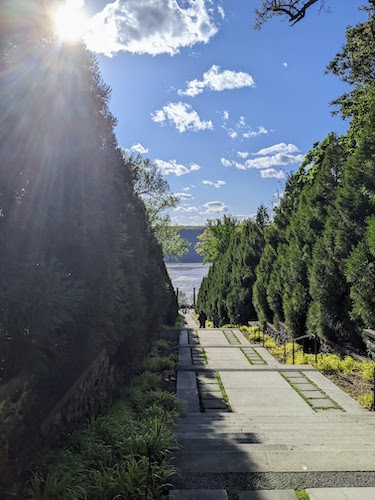 Staired walkway leading down to the Ancient Roman monolithic columns