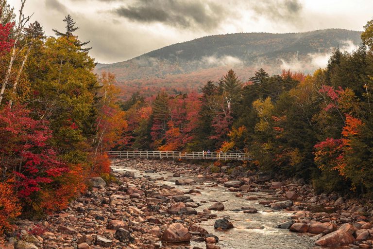 Bridge across a river amidst scenic beauty of the White Mountains New Hampshire