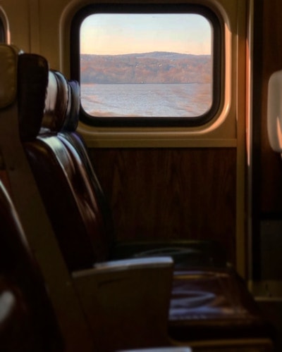 View out of a train car as it passes through the Hudson Valley of NY