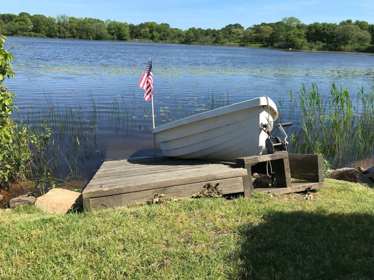 Boat on a pond in Gloucester MA, one of the best things to do on the North Shore MA