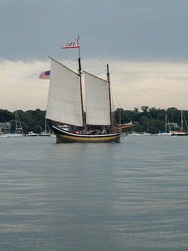 Ship sailing through Salem harbor in the North Shore region. Admiring the water is one of the best things to do on the North Shore MA