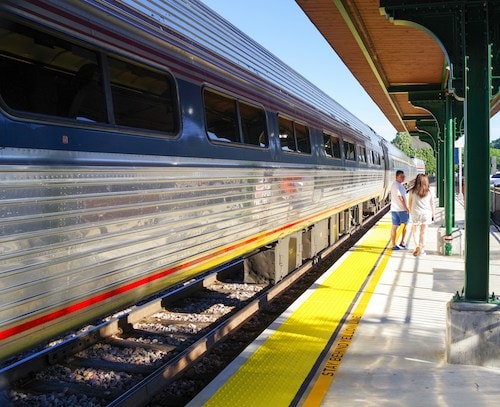 Couple on Amtrak vacations to the train station at Burlington, Vermont,